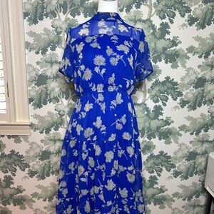 Beautiful cobalt blue lined midi dress.  Floral pattern.  Size small